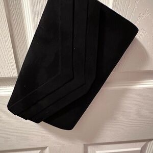 Brand new Black suede clutch purse.